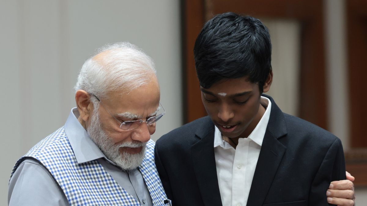 'Personification of Passion and Perseverance': PM Narendra Modi Hails Praggnanandhaa on Return to India Following FIDE World Cup Brilliance - News18